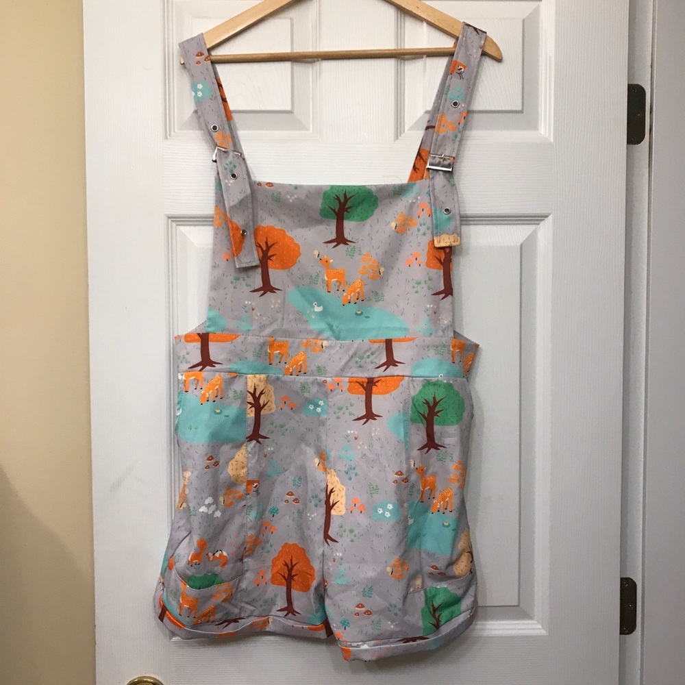 Super cute short rompers, never worn. . I have two sizes.